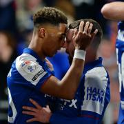 Omari Hutchinson and Conor Chaplin celebrate during Ipswich Town's thrilling 3-3 draw at Hull City on Saturday night.