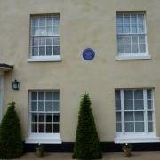 The blue plaque on Wilford Lodge, former home of Sir Archibald Garrod