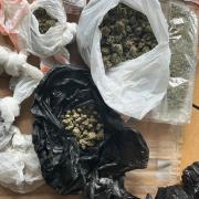 A woman was arrested after a large quantity of cannabis was seized in a police raid
