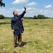 Debenham farmer Tom McVeigh searches for a mobile phone signal