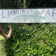 Suffolk artist Jane High with the sign she has created for Elmhurst Park in Woodbridge