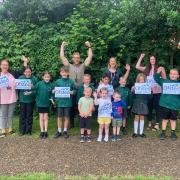 Louise Creed, Ryan Stevens, Tracey Hearth and Lucy Batt with pupils from Albert Pye Community Primary School in Beccles. Picture: Albert Pye Community Primary School