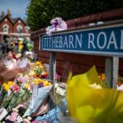 Flowers and tributes near the scene in Hart Street, Southport, where three children died and eight were injured in a knife attack during a Taylor Swift event at a dance school.