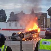 Violence unfolded in Sunderland on Friday night, with cars and a police station set on fire. Image: Daniel Hordon/Northern Echo