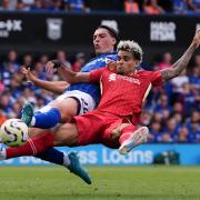 Ipswich Town's Jacob Greaves battles for the ball with Liverpool's Luis Diaz.