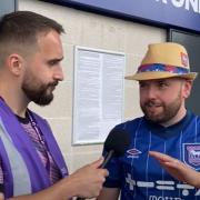 Ross Halls speaks to Ipswich Town fan Chris Peachey after yesterday's 2-0 defeat to Liverpool