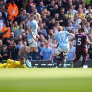 Manchester City's Kevin De Bruyne puts his side 2-1 up after an error from Ipswich Town debutant keeper Aro Muric, far left