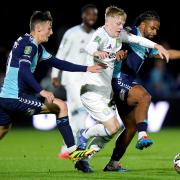 Cameron Humphreys battles against Aston Villa in the Carabao Cup.