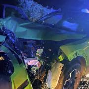 A woman was taken to hospital after a crash with a tree on a Suffolk country road