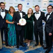 The team at the pub collecting their award in London