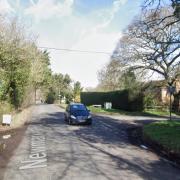 A road near a Suffolk village was blocked after a crash between a lorry and a car.