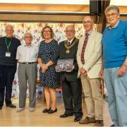 lub members Mike Lloyd, Brian Collins, Linda Wilson, and John Thrower, the mayor of Beccles Colin Hill, and museum curator Alan Wheeler receiving copies at a reception held at the Waveney Centre on Tuesday, October 8.