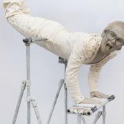 Sir Elton John is to be honoured with a waxwork of himself performing a keyboard handstand (Madame Tussauds/PA)