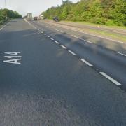 A car collided with the central reservation of the A14 near a Suffolk town.