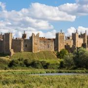 Suffolk Wildlife Trust has handed over responsibility for the mere, pictured in front of the castle, to Framlingham College