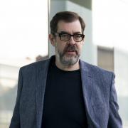 Richard Osman will co-host a live version of The Rest Is Entertainment podcast (Jordan Pettitt/PA)