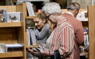 People browsing a similar event to the one coming to Sudbury Library this autumn