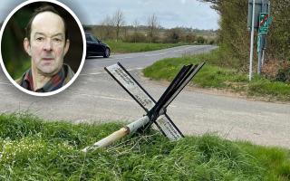 Fallen road signs in Suffolk could be causing a risk to motorists