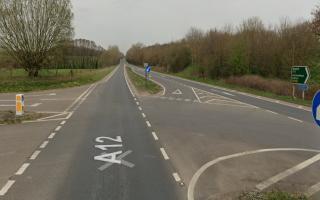 Part of the A12 is closed after two cars collided at the busy junction