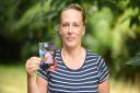 Clare Townshend holding a photo taken before her weight loss