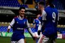 Armando Dobra and Thomas Hughes celebrate with goalscorer Kai Brown Picture: ROSS HALLS