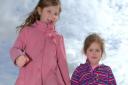 Eloise and Keeley play on the beach at Felixstowe at the start of the Easter holidays.