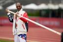 Snoop Dogg with a pole vault pole during the US athletics Olympic team trials in June (Charlie Neibergall/AP)