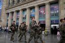 Soldiers patrol outside Gare du Nord train station in Paris (Mark Baker/AP)