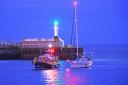 An RNLI crew battled gale force winds to rescue a stranded yacht