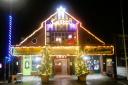 Caister Village Hall illuminated for Christmas.