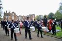 A parade in Christchurch Park on Remembrance Sunday