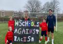 Pupils from Red Oak Primary School with head teacher Heather Madsen and Johnny Lee, PE and Sports co-ordinator, have launched a national campaign entitled 'Schools Against Racism'. Picture: Red Oak Primary School