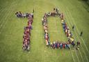 The moment all 340 children at Sir Robert Hitchams Primary School in Framlingham came together to celebrate the Queen's Platinum Jubilee by creating a 70.