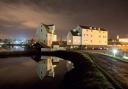 Messages to the Queen are to be illuminated onto the Tide Mill by the River Deben in Woodbridge