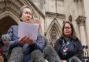 Cathy Gardner (left) and Fay Harris, whose fathers died from Covid-19, speaking outside the Royal Courts of Justice.