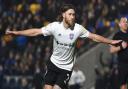 Wes Burns celebrates scoring during the second  half at AFC Wimbledon