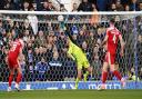 Ipswich Town keeper Christian Walton makes a fingertip first half save.