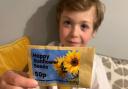 Zeb Porritt from Woodbridge is selling sunflower seeds for 50p each to raise money for children in Ukraine