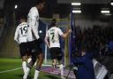 Wes Burns celebrates scoring during the second  half at AFC Wimbledon