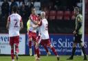 Elliott List celebrates converting the penalty that won the game for Stevenage against Colchester United.