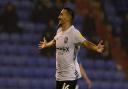 Idris El Mizouni celebrates scoring to put Ipswich in front in the 81st minute at Boundary Park.