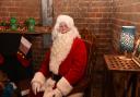 Santa in his coronavirus secure grotto in Nowton Park