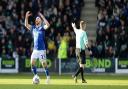 Conor Chaplin shows his frustrations with the referee at Home Park.