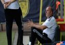 Paul Cook before kick-off at Burton Albion.