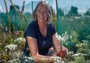 Jane tending to the flowers on Oak Tree Community Farm.