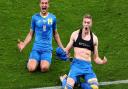 Ukraine's players celebrate their last minute win over Sweden - they face England in the Euro 2020 quarter-finals in Rome today