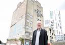 Ipswich Borough Council leader David Ellesmere outside the former R&W Paul silo