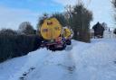 An oil tanker is blocking Mill Road in Badingham after becoming stuck in a ditch.