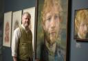 Artist Colin Davidson next to his portraits of Ed Sheeran  Picture: SARAH LUCY BROWN