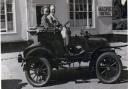 Jeanne Bowker in a rally car outside the Magpie Hotel during the early 1950s